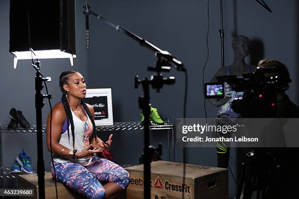 Lita Lewis attends the Reebok Seeding Lounge Workout with French Montana, Lita Lewis And DJ Drama at Reebok Lounge on February 11, 2015 in West...