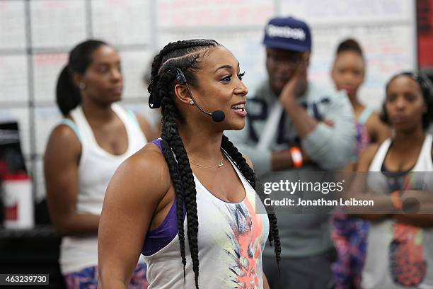 Lita Lewis attends the Reebok Seeding Lounge Workout with French Montana, Lita Lewis And DJ Drama at Reebok Lounge on February 11, 2015 in West...