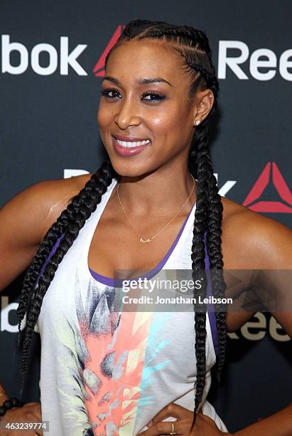 Lita Lewis attends the Reebok Seeding Lounge Workout with French Montana, Lita Lewis And DJ Drama at Reebok Lounge on February 11, 2015 in West...