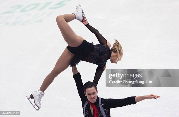 Kristen Moore-Towers and Michael Marinaro of Canada performs during the Pairs Short Program on day one of the ISU Four Continents Figure Skating...