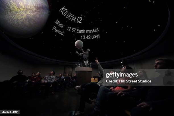 students watching planet in planetarium - mars curiosity stock pictures, royalty-free photos & images