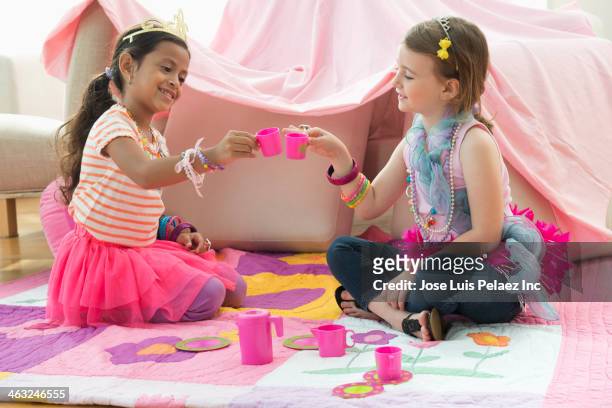 girls having tea party - solo bambini foto e immagini stock