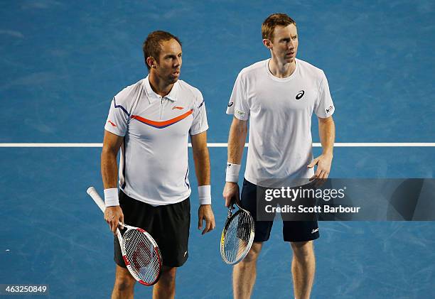 Paul Hanley of Australia and Jonathan Marray of Great Britain in action in their first round doubles match against Bob Bryan of the United States and...