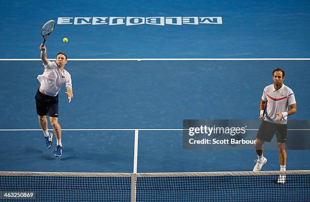 Paul Hanley of Australia and Jonathan Marray of Great Britain in action in their first round doubles match against Bob Bryan of the United States and...