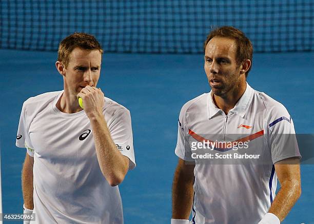 Paul Hanley of Australia and Jonathan Marray of Great Britain in action in their first round doubles match against Bob Bryan of the United States and...