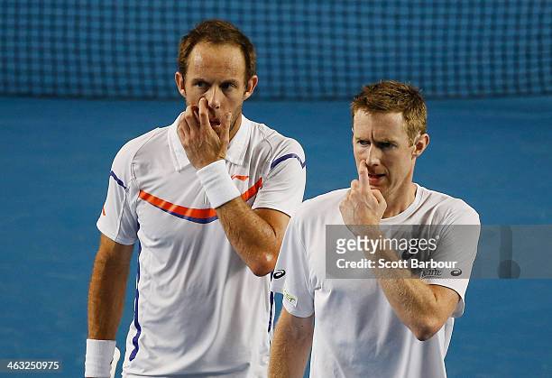 Paul Hanley of Australia and Jonathan Marray of Great Britain in action in their first round doubles match against Bob Bryan of the United States and...
