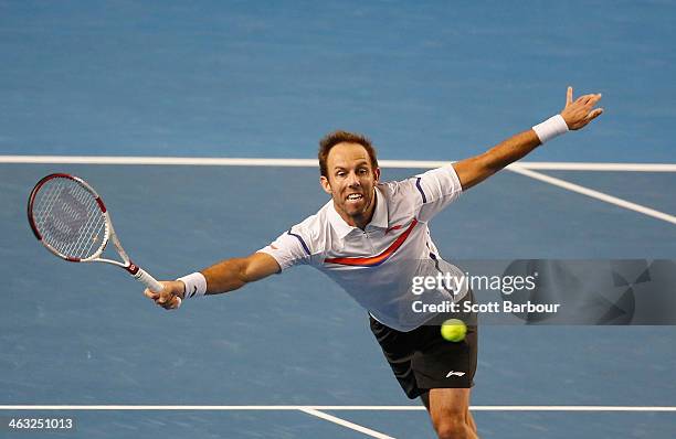 Paul Hanley of Australia in action with Jonathan Marray of Great Britain during their first round doubles match against Bob Bryan of the United...