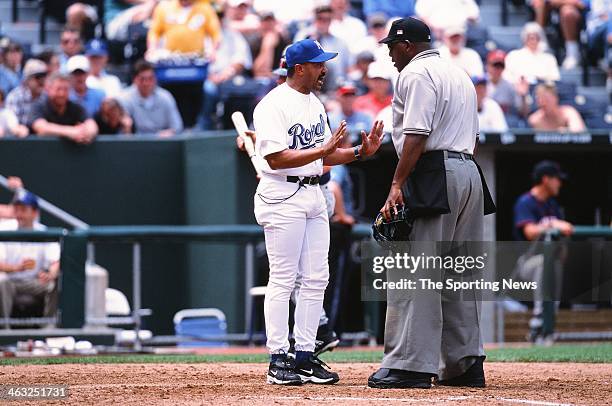 Tony Pena of the Kansas City Royals talks with umpire Chuck Meriwether during the game against the Minnesota Twins on May 16, 2002 at Kauffman...