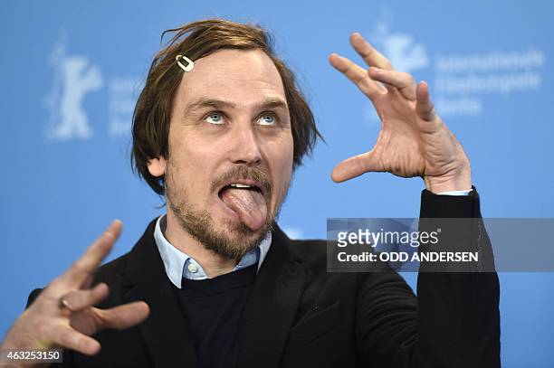 German actor Lars Eidinger poses during a photocall of the film "Vergine giurata" by Italian director Laura Bispuri in competition at the 65th Berlin...