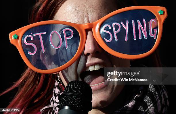 Alli McCracken joins activists protesting the surveillance of U.S. Citizens by the NSA outside the Justice Department where U.S. President Barack...