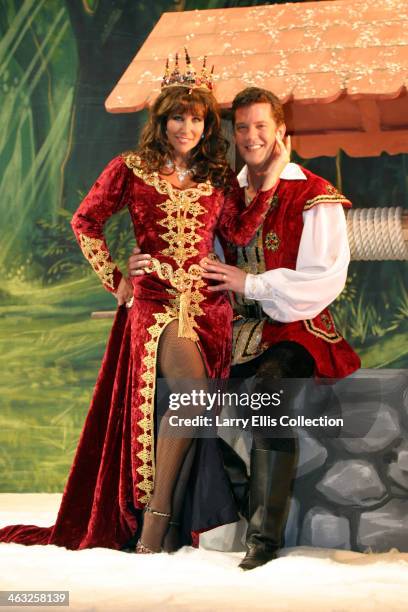 English actress Linda Lusardi as the evil Queen Lucretia with her husband Sam Kane as the Prince in the pantomine 'Snow White and the Seven Dwarfs',...