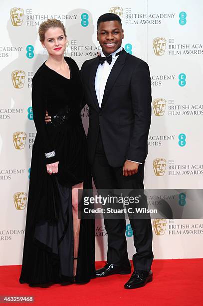 Alice Eve and John Boyega pose in the winners room at the EE British Academy Film Awards at The Royal Opera House on February 8, 2015 in London,...