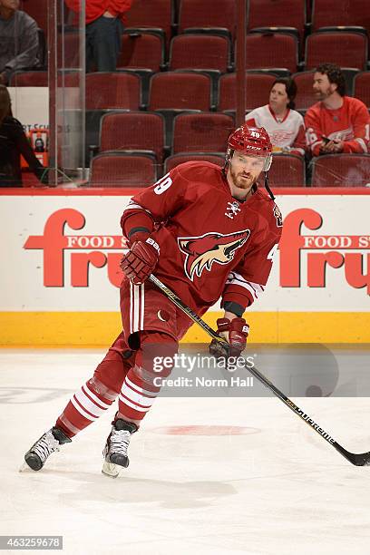 Alexandre Bolduc of the Arizona Coyotes prepares for a game against the Detroit Red Wings at Gila River Arena on February 7, 2015 in Glendale,...