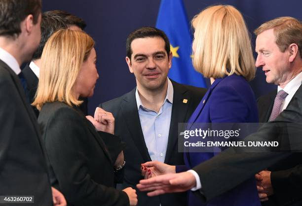 Greek Prime Minister Alexis Tsipras speaks with EU foreign policy chief Federica Mogherini , Danish Prime Minister Helle Thorning-Schmidt and Irish...
