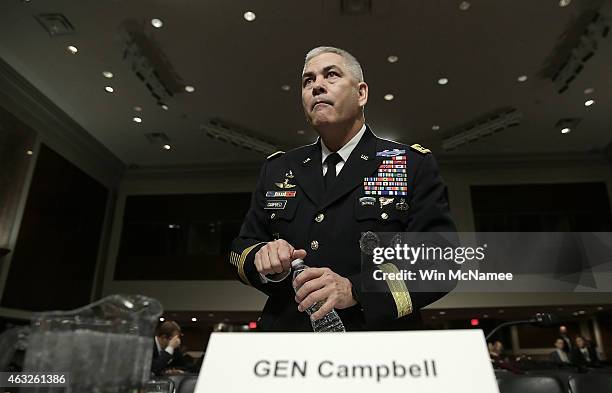 Army Gen. John Campbell, commander of the International Security Assistance Force, U.S. Forces-Afghanistan, waits to testify before the Senate Armed...