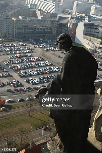 Statue stands on the tower of City Hall in the city center on February 12, 2015 in Dresden, Germany. The area, as well as the vast majority of the...