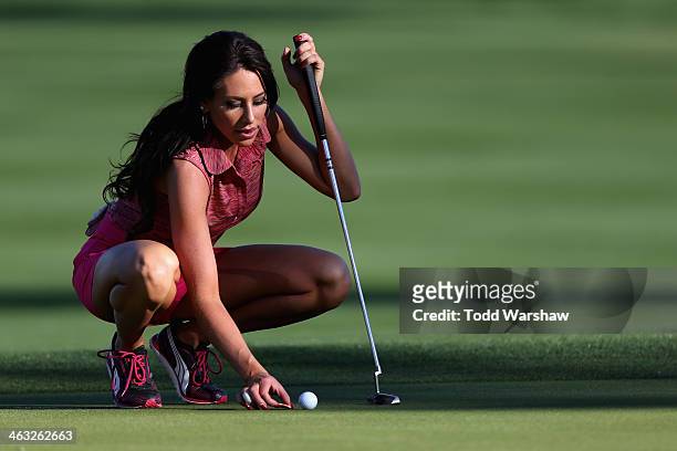 Holly Sonders lines up a putt at the ninth hole of La Quinta Country Club Course during the first round of the Humana Challenge in partnership with...