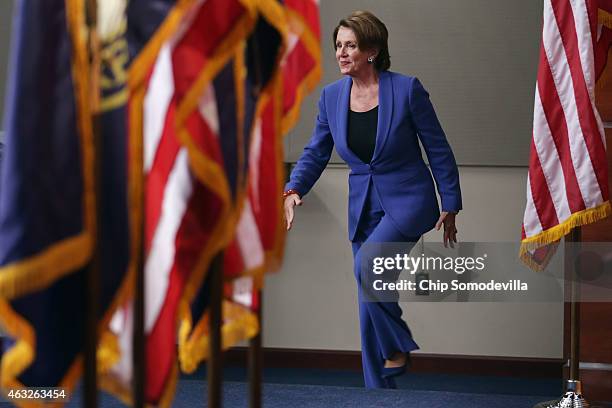 House Minority Leader Nancy Pelosi arrives for her weekly news conference in the Capitol Visitors Center at the U.S. Capitol February 12, 2015 in...