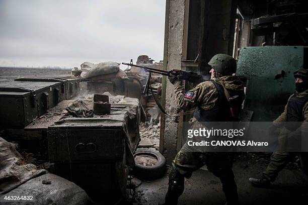 The conflict becomes intensified in the east of Ukraine between pro Russians and Ukrainian army. The militiamen of Vostok battalion in the ruins of...
