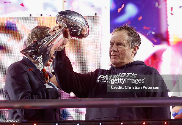 Head coach Bill Belichick of the New England Patriots celebrates with the Vince Lombardi Trophy after defeating the Seattle Seahawks 28-24 to win...