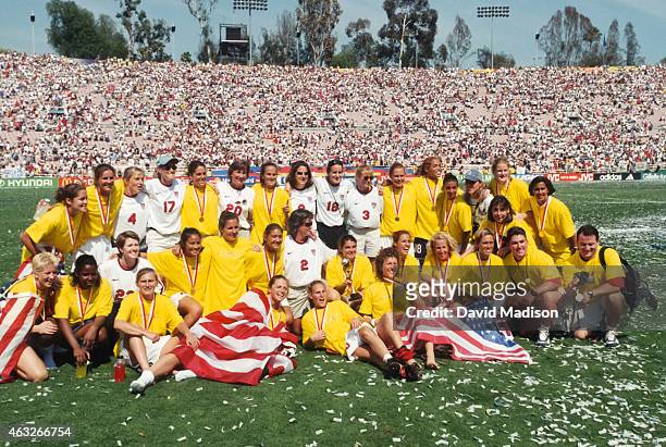 Members of the USA Women's National Team and friends celebrate winning the 1999 FIFA Women's World Cup following the final game played against China...