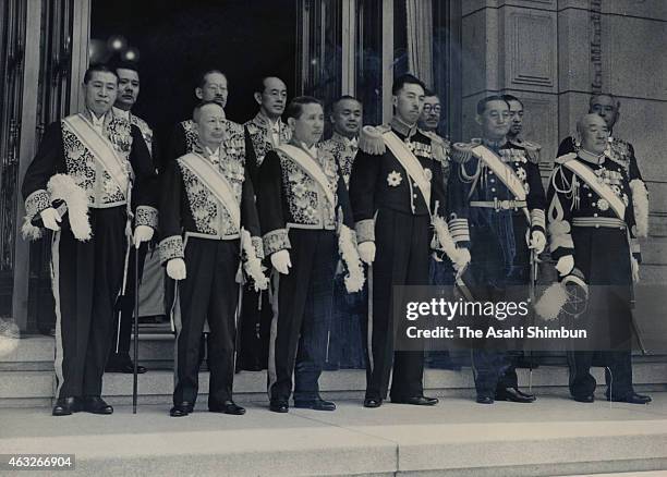 Prime Minister Fumimaro Konoe and other cabinet members pose for photographs prior to the opening of the extraordinary session of the Imperial diet...