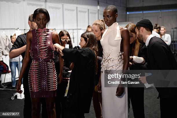 Model is getting styled backstage ahead of the Marina Hoermanseder show during Mercedes-Benz Fashion Week Autumn/Winter 2014/15 at Brandenburg Gate...