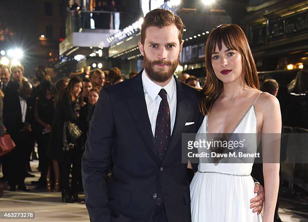 Jamie Dornan and Dakota Johnson attend the UK Premiere of "Fifty Shades Of Grey" at Odeon Leicester Square on February 12, 2015 in London, England.