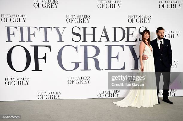 Dakota Johnson and Jamie Dornan attend the UK Premiere of "Fifty Shades Of Grey" at Odeon Leicester Square on February 12, 2015 in London, England.