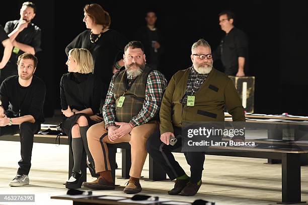 Robert Tagliapietra and Jeffrey Costello prepare backstage at the Costello Tagliapietra fashion show during Mercedes-Benz Fashion Week Fall 2015 at...