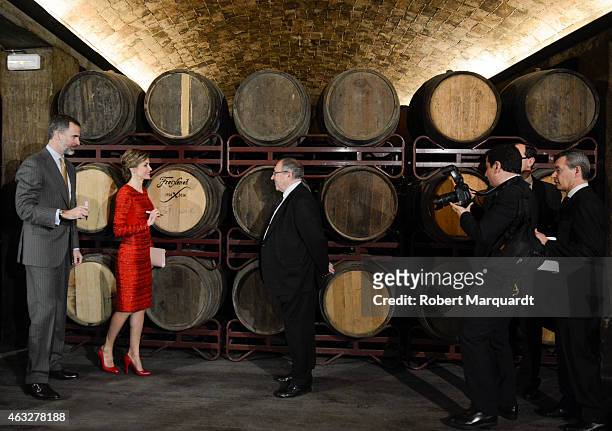 King Felipe VI of Spain and Queen Letizia of Spain visit the 'Freixenet' wine cellar on February 12, 2015 in Sant Sadurni d'Anoia, Spain. Freixenet...