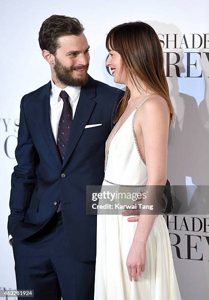 Dakota Johnson and Jamie Dornan attend the UK Premiere of "Fifty Shades Of Grey" at Odeon Leicester Square on February 12, 2015 in London, England.