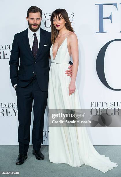 Dakota Johnson and Jamie Dornan attend the UK Premiere of "Fifty Shades Of Grey" at Odeon Leicester Square on February 12, 2015 in London, England.