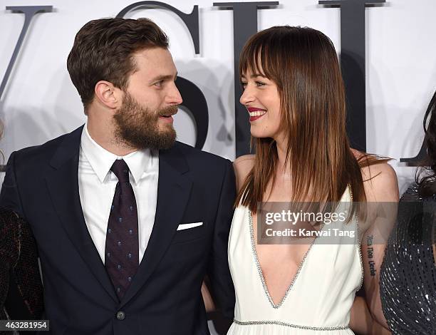 Jamie Dornan and Dakota Johnson attend the UK Premiere of "Fifty Shades Of Grey" at Odeon Leicester Square on February 12, 2015 in London, England.