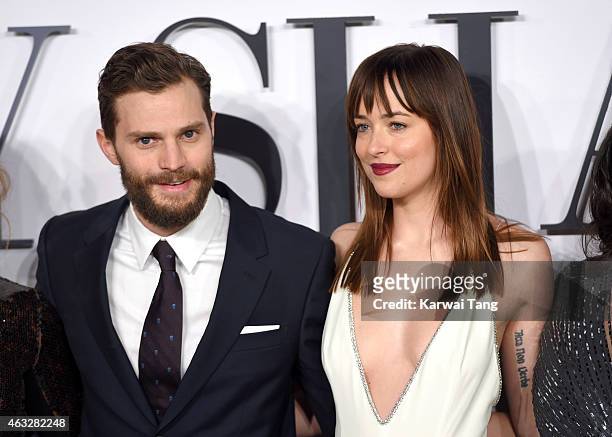 Jamie Dornan and Dakota Johnson attend the UK Premiere of "Fifty Shades Of Grey" at Odeon Leicester Square on February 12, 2015 in London, England.