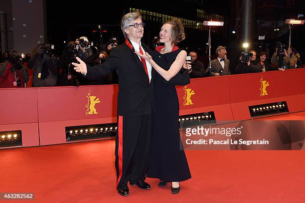 Director Wim Wenders and wife Donata Wenders attend the 'The American Friend' screening during the 65th Berlinale International Film Festival at...