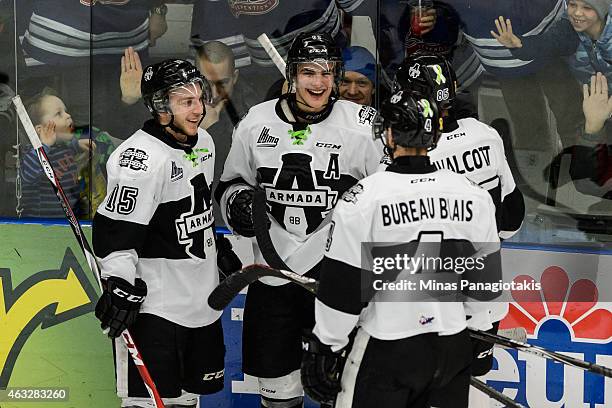 Danick Martel of the Blainville-Boisbriand Armada celebrates his goal with teammates during the QMJHL game against the Victoriaville Tigres at the...