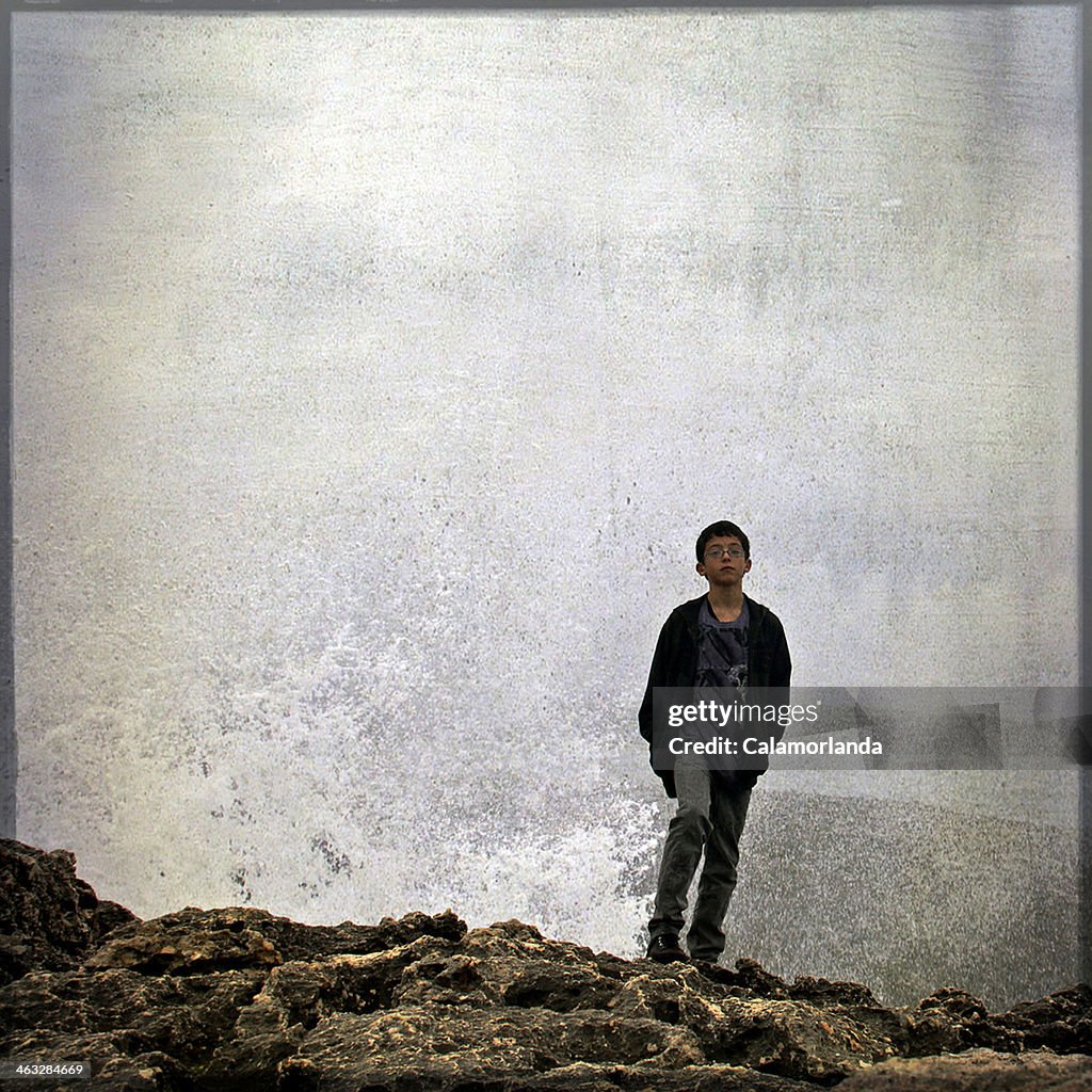 Boy near waves