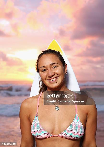 Professional surfer Carissa Moore of Hawaii poses during a portrait session at Manly Beach on February 13, 2015 in Sydney, Australia. Moore is...