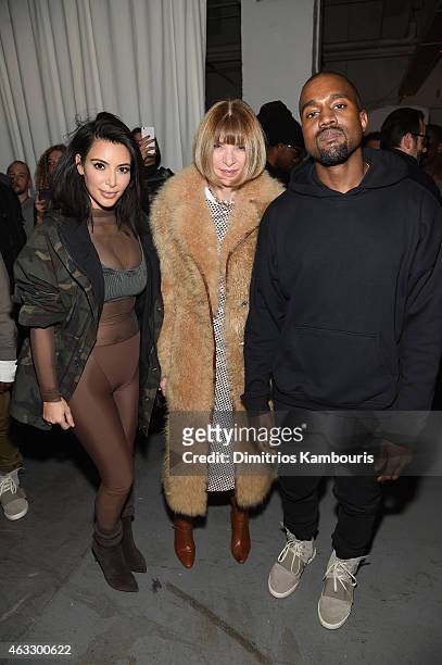 Kim Kardashian, Anna Wintour, and Kanye West pose backstage at the adidas Originals x Kanye West YEEZY SEASON 1 fashion show during New York Fashion...