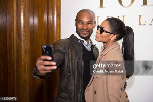 Tyson Beckford and Ciara attend the Ralph Lauren Polo Mens and Womens presentation during Mercedes-Benz Fashion Week Fall 2015 on February 12, 2015...