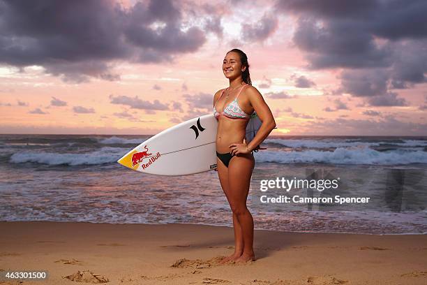 Professional surfer Carissa Moore of Hawaii poses during a portrait session at Manly Beach on February 13, 2015 in Sydney, Australia. Moore is...