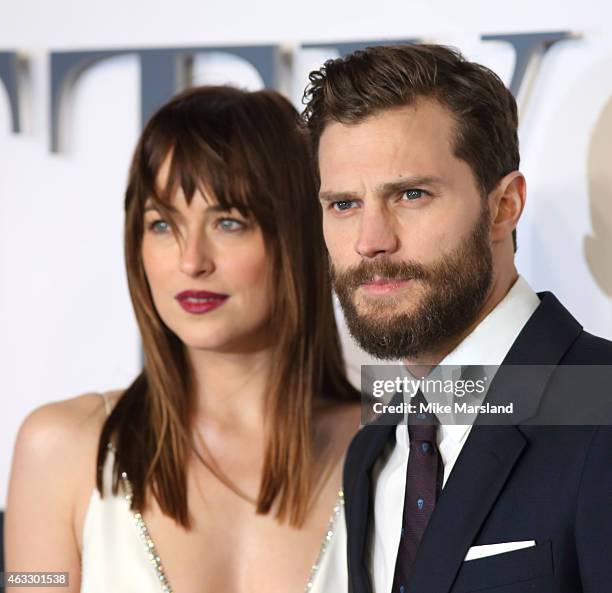 Dakota Johnson and Jamie Dornan attend the UK Premiere of "Fifty Shades Of Grey" at Odeon Leicester Square on February 12, 2015 in London, England.