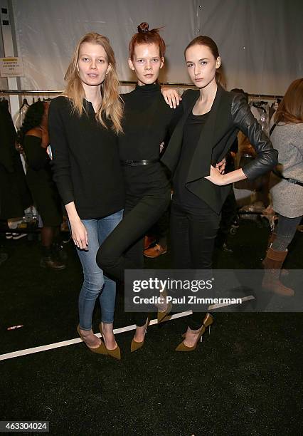 Models prepare backstage at the Tome show during Mercedes-Benz Fashion Week Fall 2015 at The Pavilion at Lincoln Center on February 12, 2015 in New...