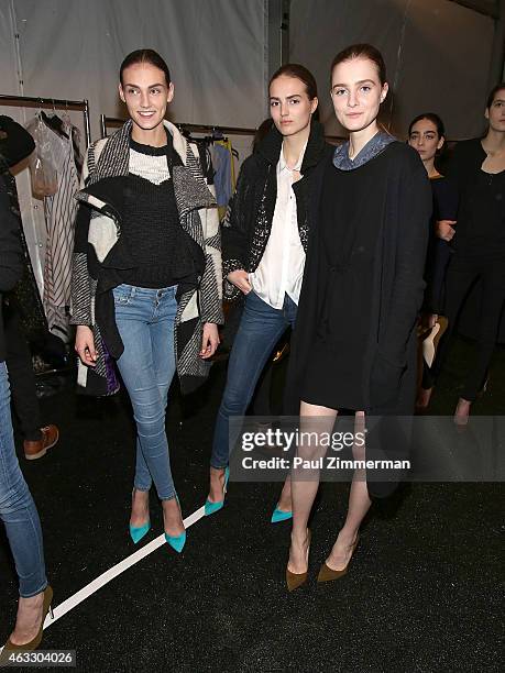 Models prepare backstage at the Tome show during Mercedes-Benz Fashion Week Fall 2015 at The Pavilion at Lincoln Center on February 12, 2015 in New...