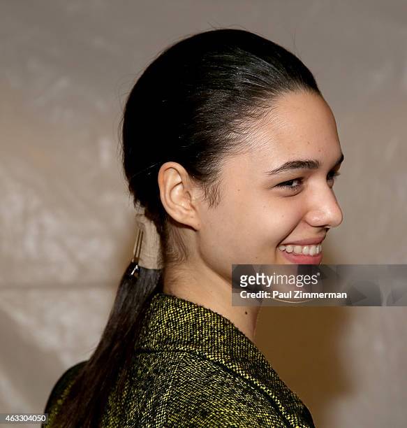 Model prepares backstage at the Tome show during Mercedes-Benz Fashion Week Fall 2015 at The Pavilion at Lincoln Center on February 12, 2015 in New...