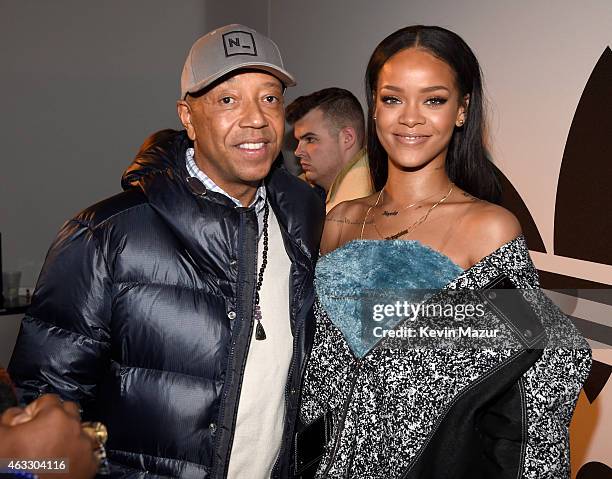 Russell Simmons and Rihanna attend the adidas Originals x Kanye West YEEZY SEASON 1 fashion show during New York Fashion Week Fall 2015 at Skylight...