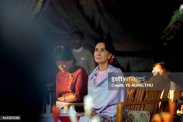 Myanmar opposition leader Aung San Suu Kyi is pictured after arriving to attend a ceremony to mark the 100th birthday of her father, independence...