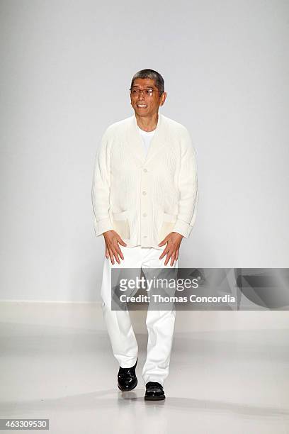 Tadashi Shoji greets the audience after presenting his Fall 2015 collection during Mercedes-Benz Fashion Week Fall 2015 at The Salon at Lincoln...