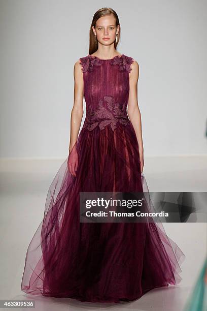 Model walks the runway at the Tadashi Shoji show during Mercedes-Benz Fashion Week Fall 2015 at The Salon at Lincoln Center on February 12, 2015 in...